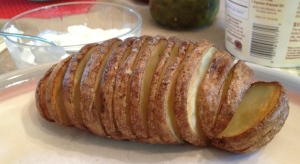 A cooked hasselback, just begging for some sour cream and fresh-from-the-garden spring onions! 